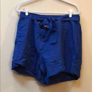 NWT blue shorts with a belt